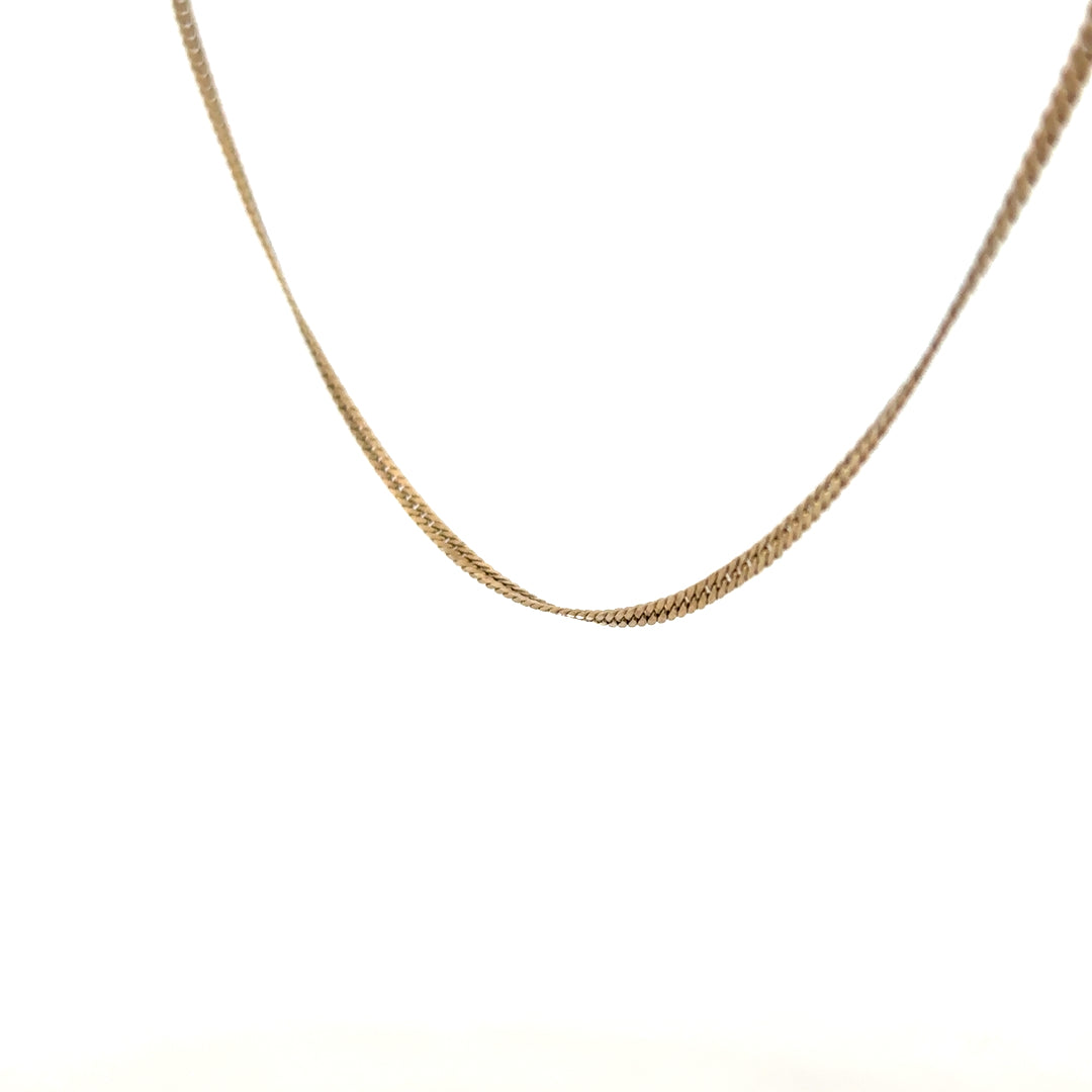 9ct yellow gold chain weighing 4.6g, unbranded, with a classic link design, displayed on a neutral background.