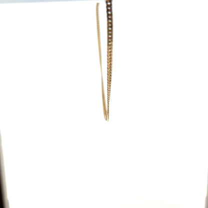 9ct yellow gold chain weighing 4.6g, unbranded jewelry with a classic link design, shown on a plain background.