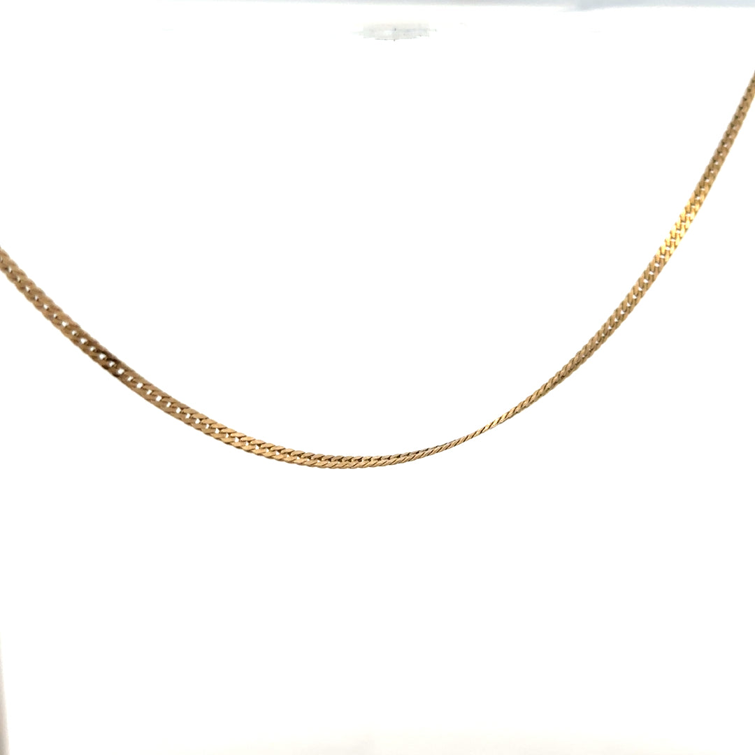 9ct yellow gold chain weighing 4.6 grams, unbranded, with a classic link design, shown in a close-up image.