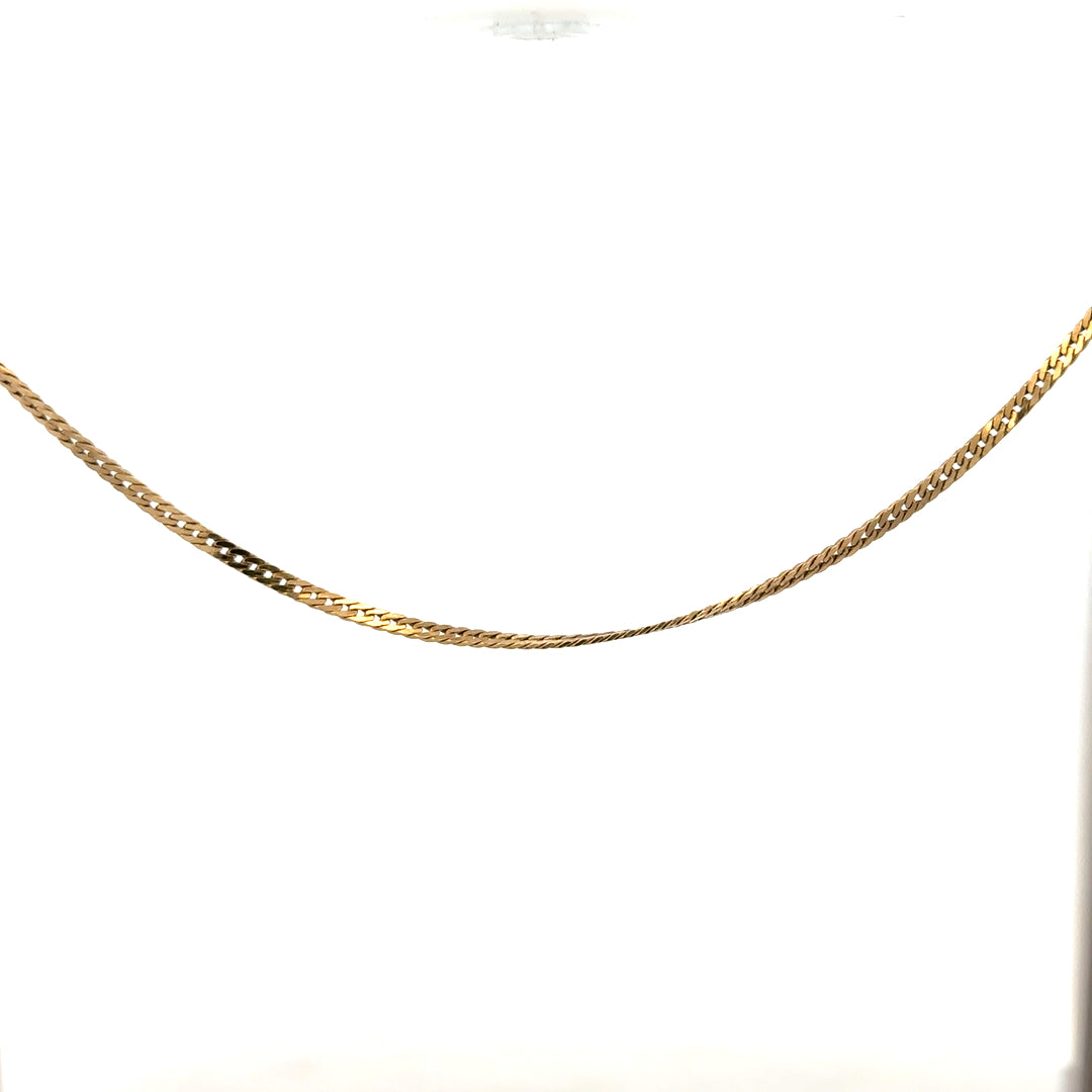 9ct yellow gold chain weighing 4.6g, featuring a delicate link design, unbranded jewelry piece on a neutral background.
