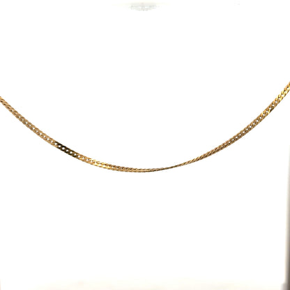 9ct yellow gold chain weighing 4.6g, featuring a delicate link design, unbranded jewelry piece on a neutral background.