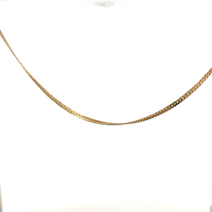 9ct yellow gold chain weighing 4.6g, unbranded, with a classic link design, shown lying flat on a neutral background.