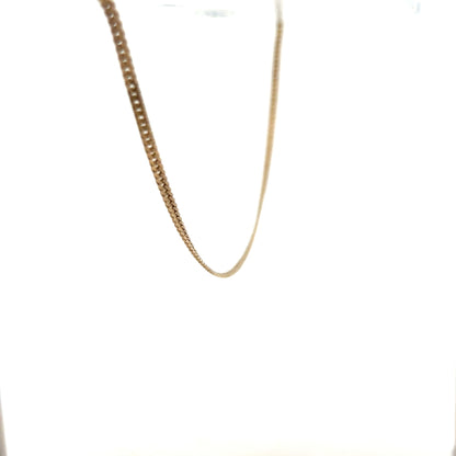 9ct yellow gold chain weighing 4.6g, unbranded, shown in this image with detailed close-up of the fine link design.