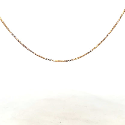9ct yellow gold chain weighing 6.1g, unbranded, with a classic link design, shown laid flat against a plain background.