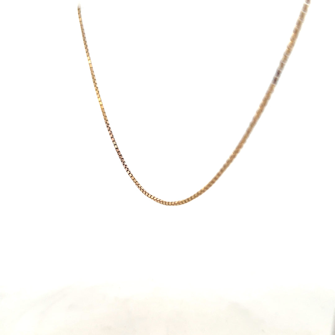 9ct yellow gold chain weighing 6.1g, unbranded, with a classic link design, shown on a neutral background.