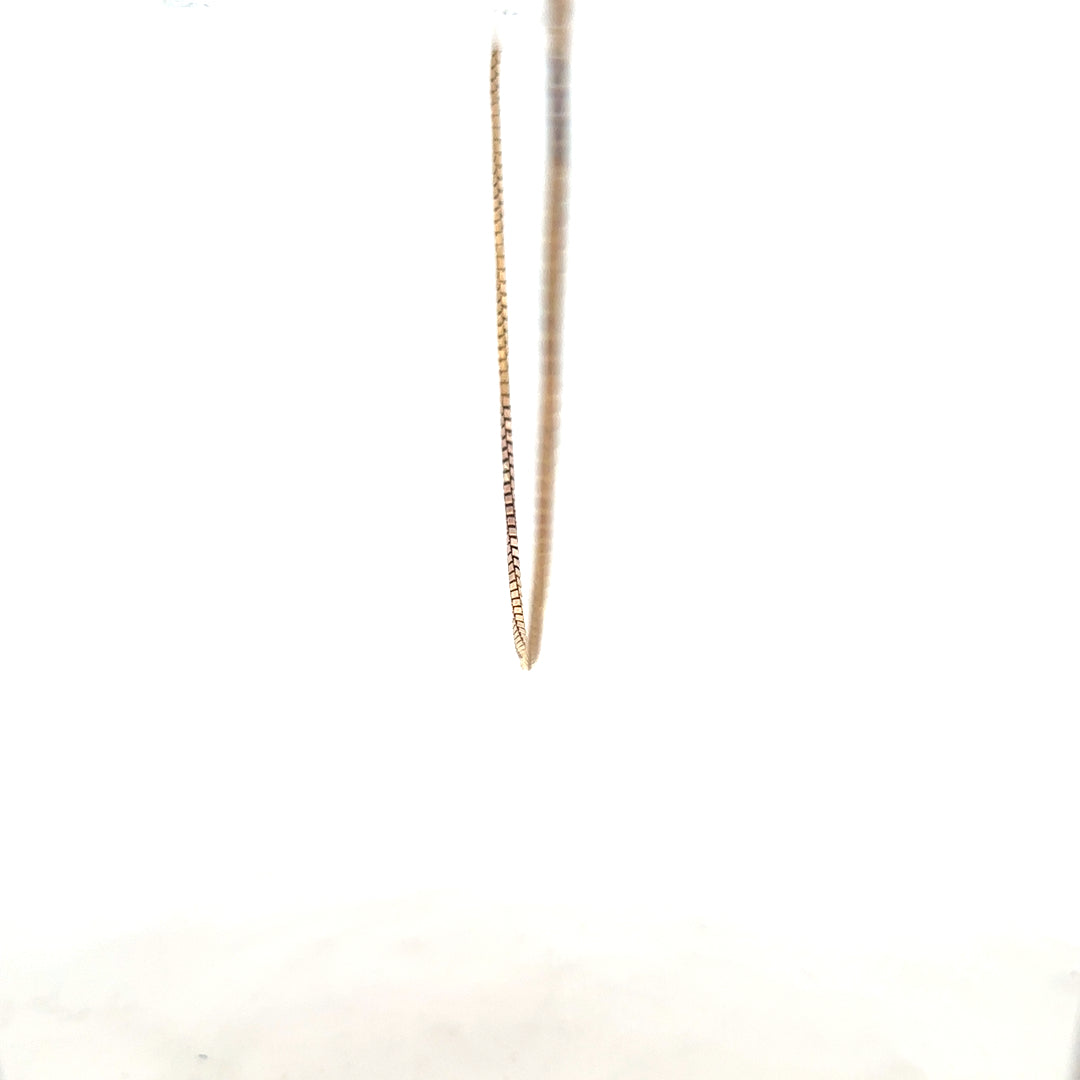 9ct yellow gold chain weighing 6.1g, unbranded, with a classic link design, displayed on a white background.