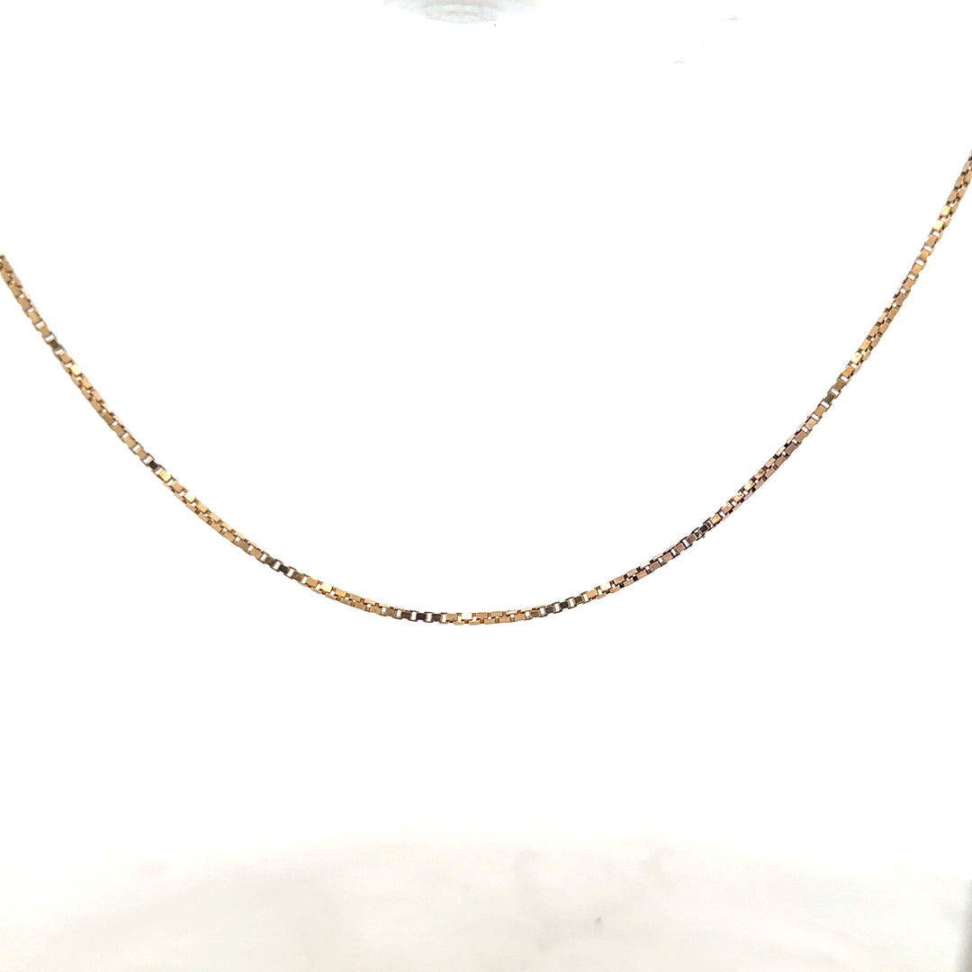 9ct yellow gold chain weighing 6.1g, unbranded, with detailed link design, displayed against a neutral background.