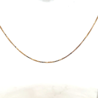 9ct yellow gold chain weighing 6.1g, unbranded, with detailed link design, displayed against a neutral background.