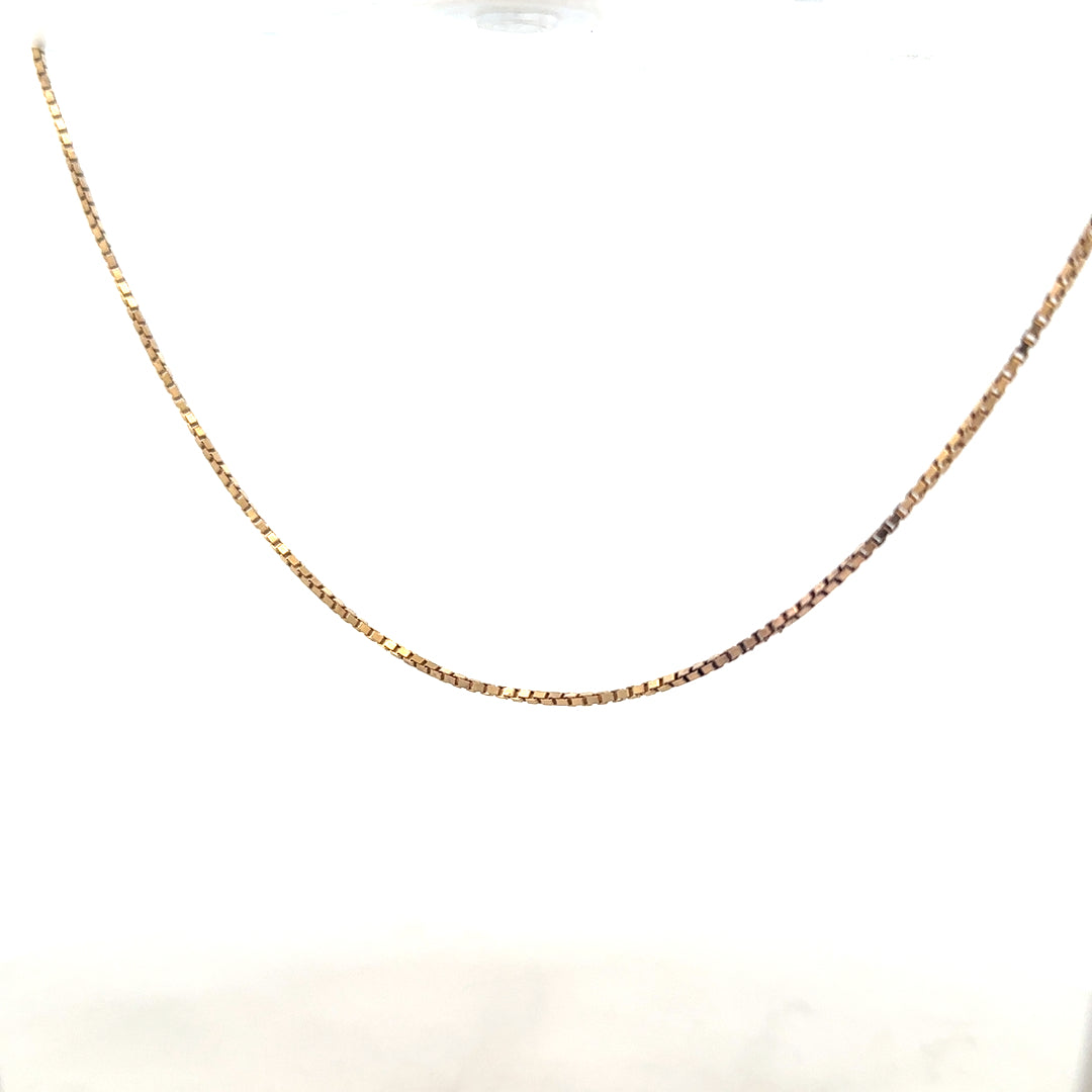 9ct yellow gold chain weighing 6.1g, unbranded, with a classic link design, displayed on a plain background.