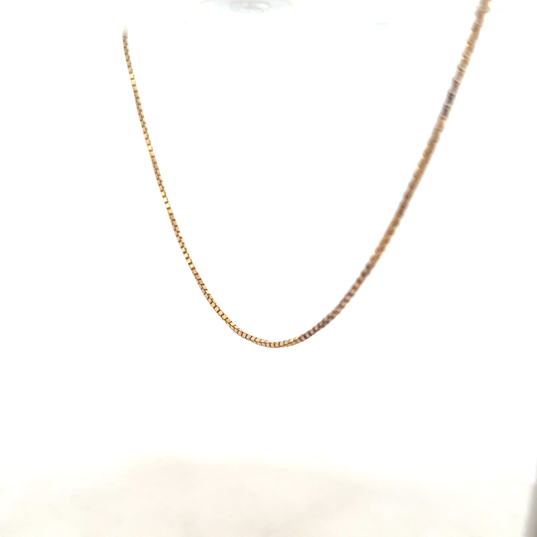 9ct yellow gold chain weighing 6.1g, unbranded, with a classic linked design, shown on a plain background.
