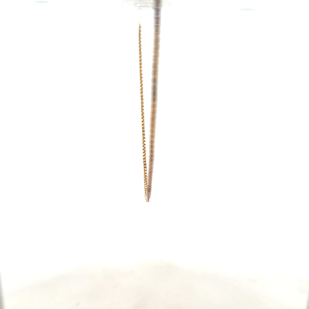 9ct yellow gold chain weighing 6.1g, unbranded, with a classic link design, shown in a detailed close-up image.