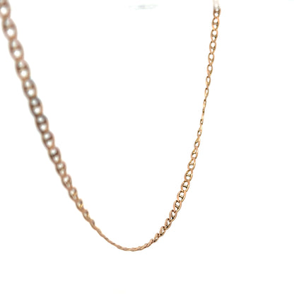 9ct yellow gold chain weighing 6.7g, unbranded jewelry with a detailed close-up of the elegant gold chain.
