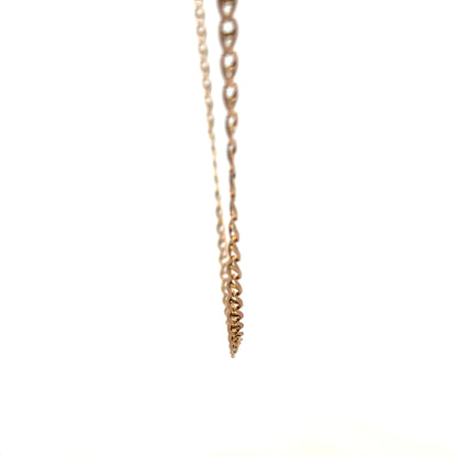 9ct yellow gold chain weighing 6.7g, displayed on a plain background, showcasing its fine link design and polished finish.