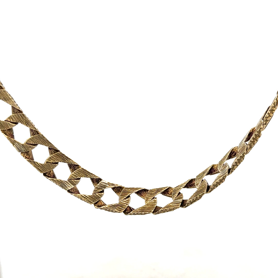 9ct yellow gold chain weighing 61.2g, unbranded jewelry with a polished finish and intricate link design.