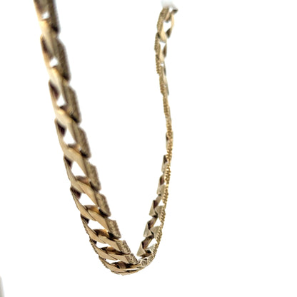 9ct yellow gold chain weighing 61.2g, unbranded, with a detailed close-up of its links and polished finish.