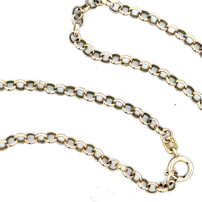 9ct yellow gold chain weighing 7.2g, featuring a classic link design, shown in a close-up image highlighting its shine and craftsmanship.