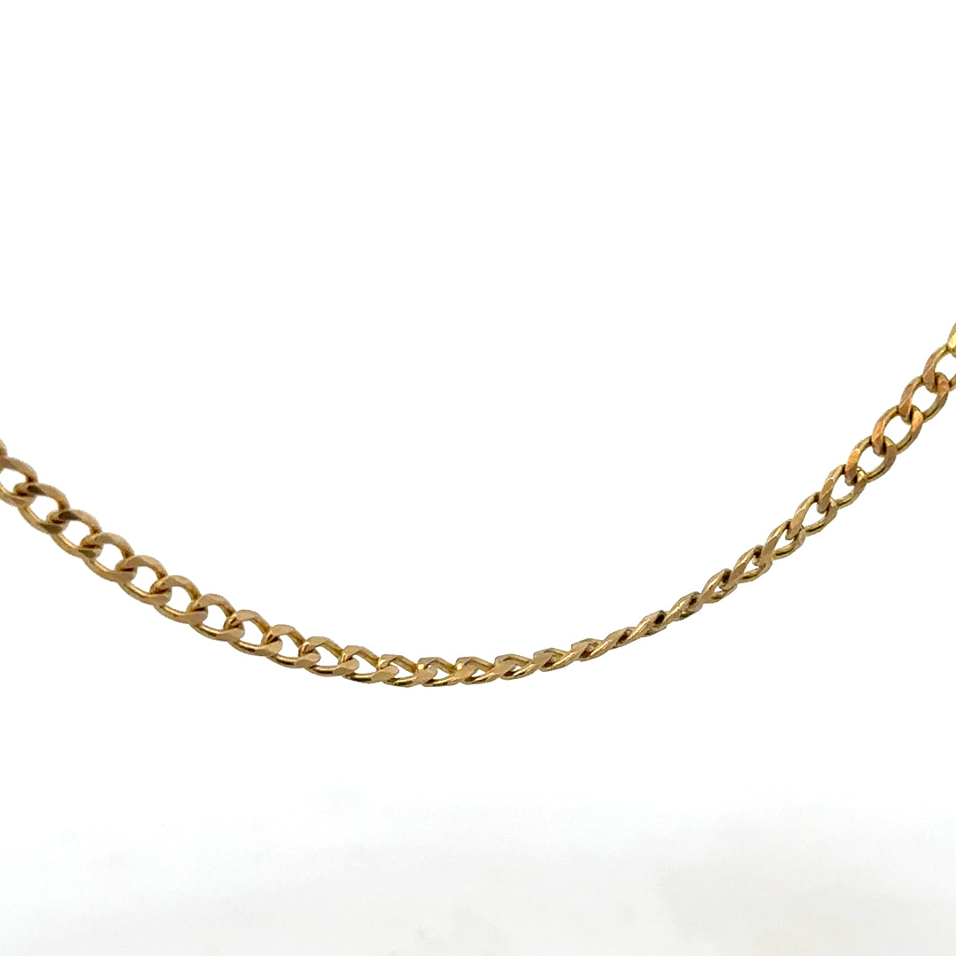 9ct yellow gold chain weighing 7.4g with a classic link design, unbranded jewelry piece on a plain background.