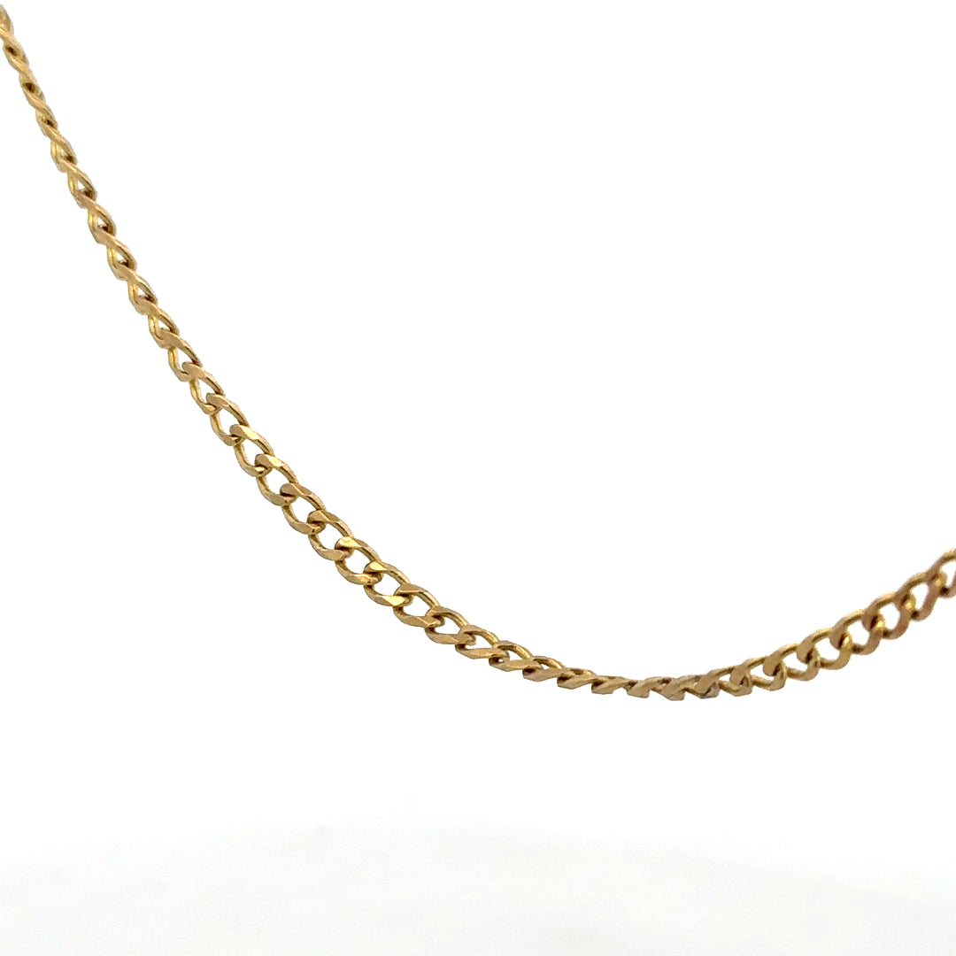 9ct yellow gold chain weighing 7.4g, featuring a classic design and smooth links, perfect for everyday wear.
