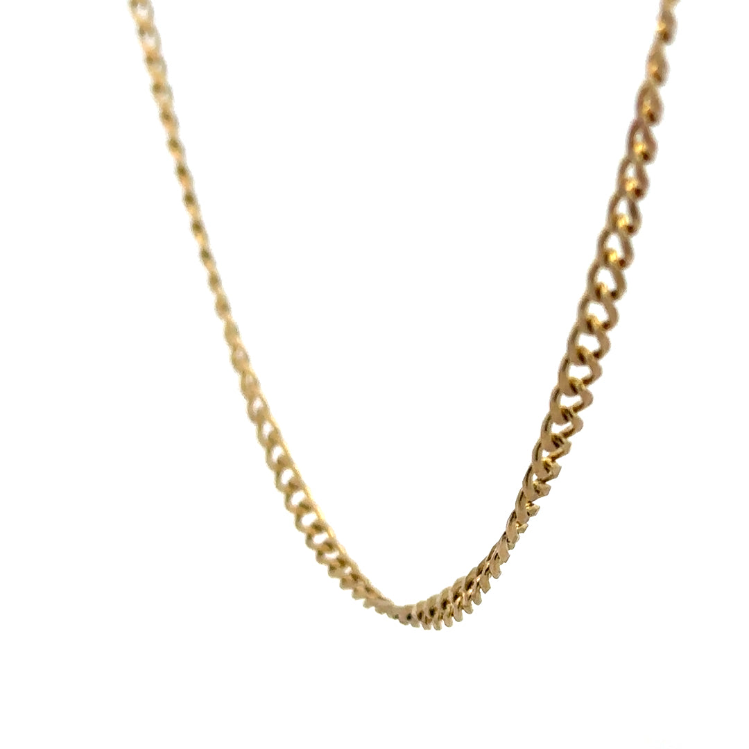 9ct yellow gold chain weighing 7.4g, unbranded, with a classic design, shown in a detailed close-up image.