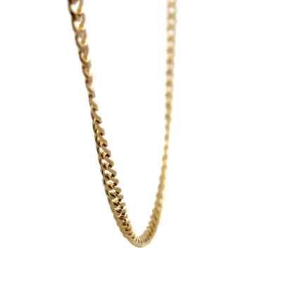 9ct yellow gold chain weighing 7.4g, unbranded, with a detailed close-up of the link design and polished finish.