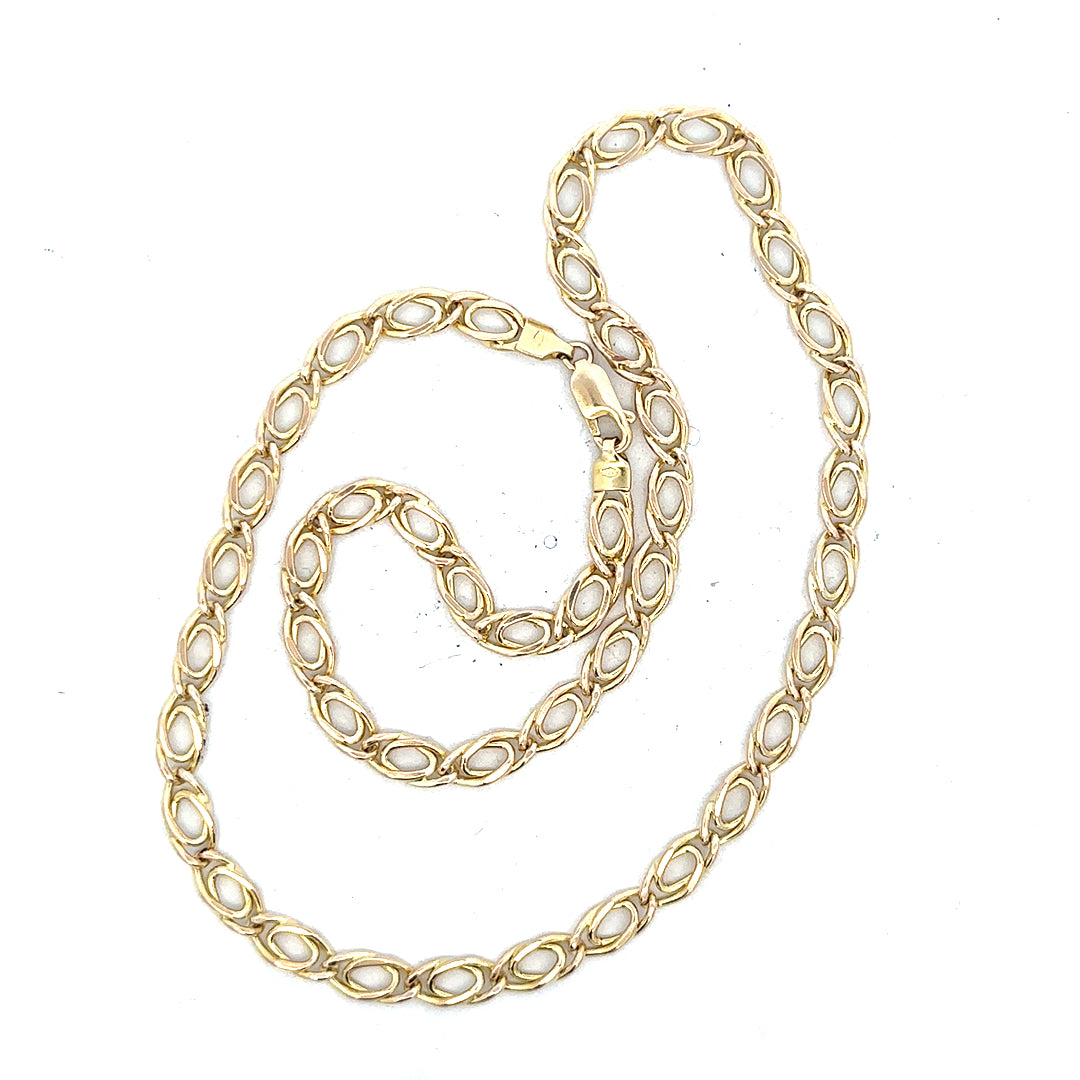 9ct yellow gold chain weighing 7.8g, showcasing a classic jewelry design with a smooth, polished finish.
