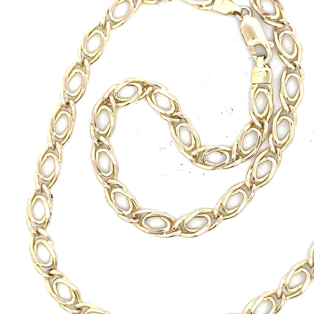 9ct yellow gold chain weighing 7.8g, featuring a classic link design, unbranded jewelry for everyday wear.