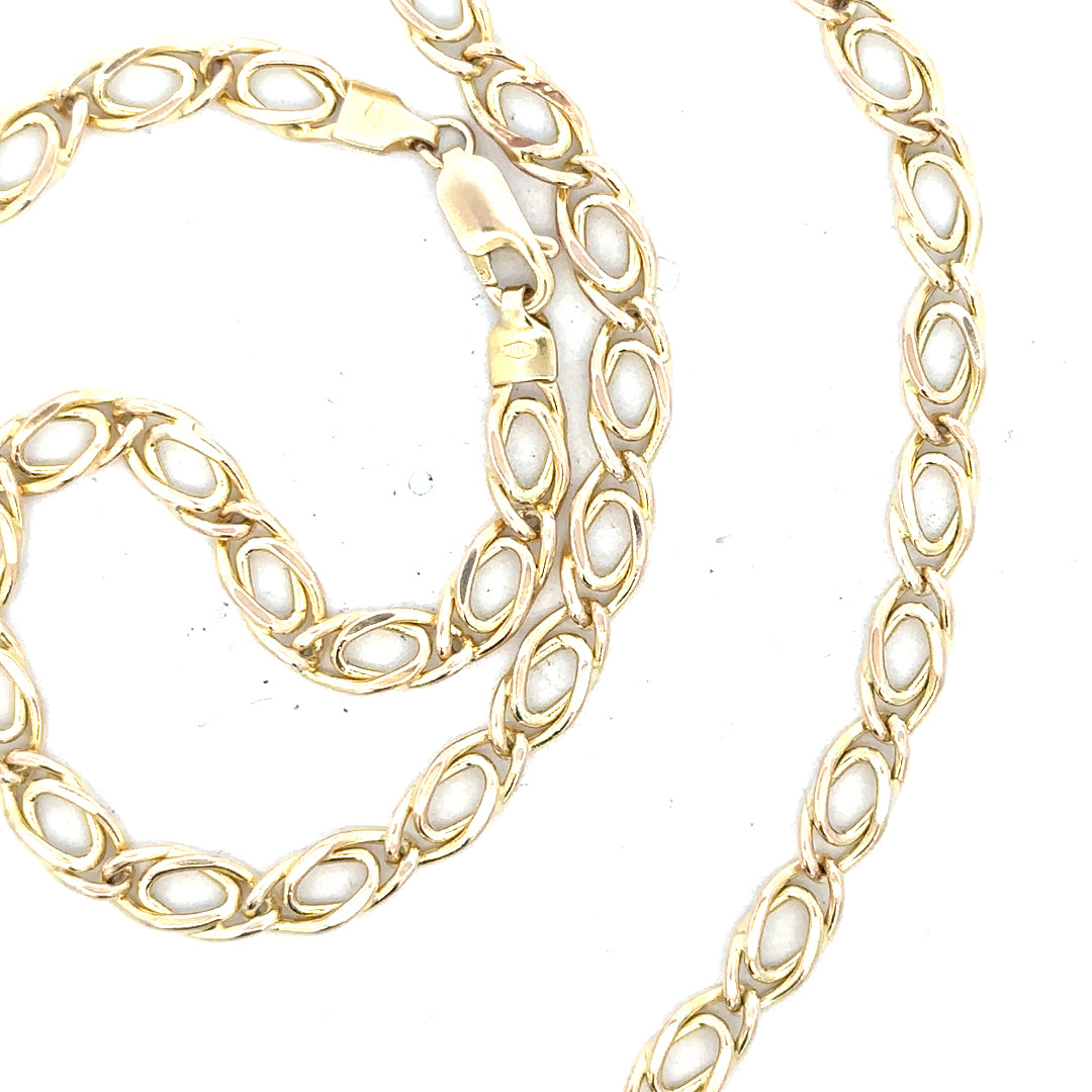 9ct yellow gold chain weighing 7.8g, unbranded, with a classic link design, shown in a close-up view against a neutral background.