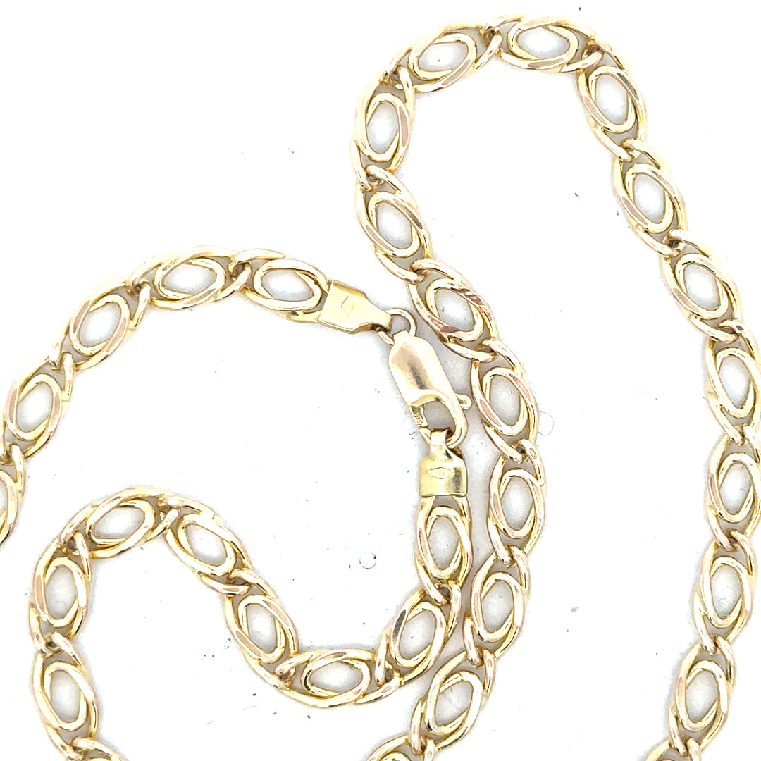 9ct yellow gold chain weighing 7.8g, featuring a classic link design, unbranded jewelry displayed on a neutral background.