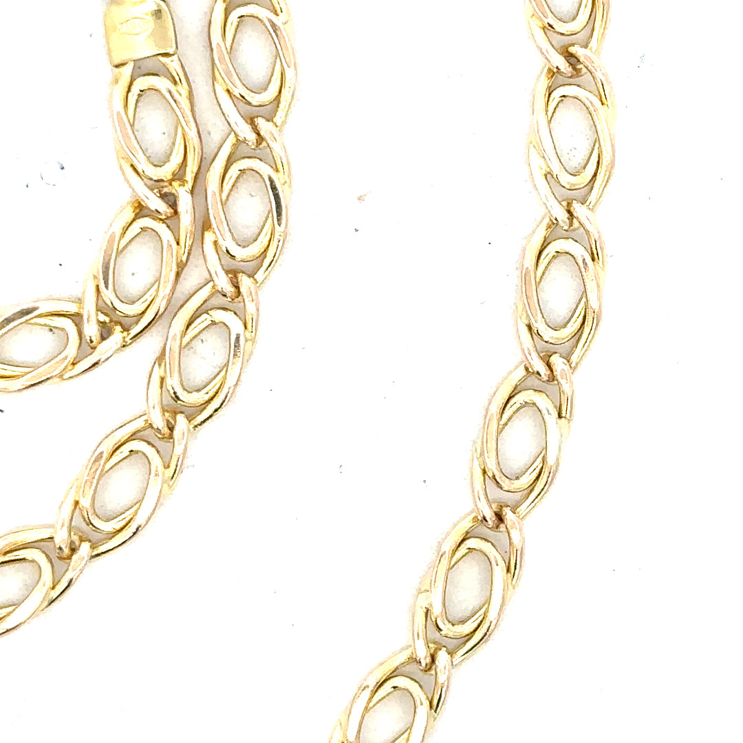 9ct yellow gold chain weighing 7.8g, unbranded jewelry accessory with a classic design, shown in a detailed close-up image.
