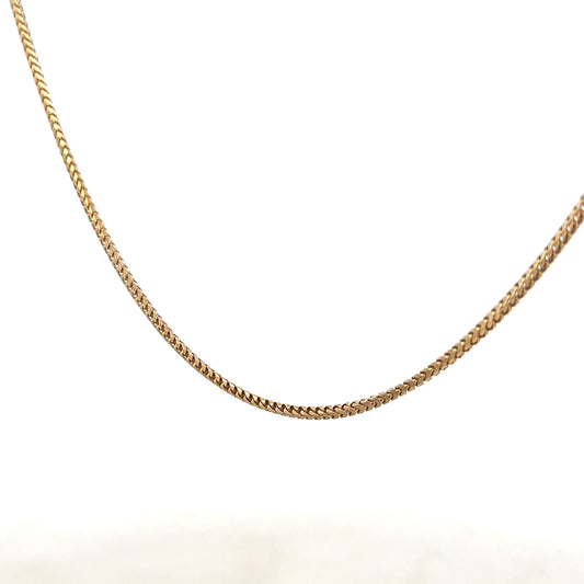 9ct yellow gold chain weighing 9.2g, unbranded, with a classic link design, shown in a close-up image.