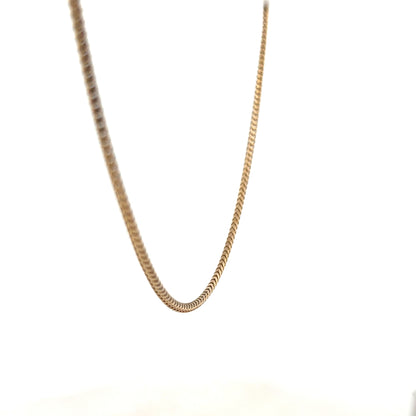 9ct yellow gold chain weighing 9.2 grams, unbranded jewelry with a classic link design, displayed on a plain background.