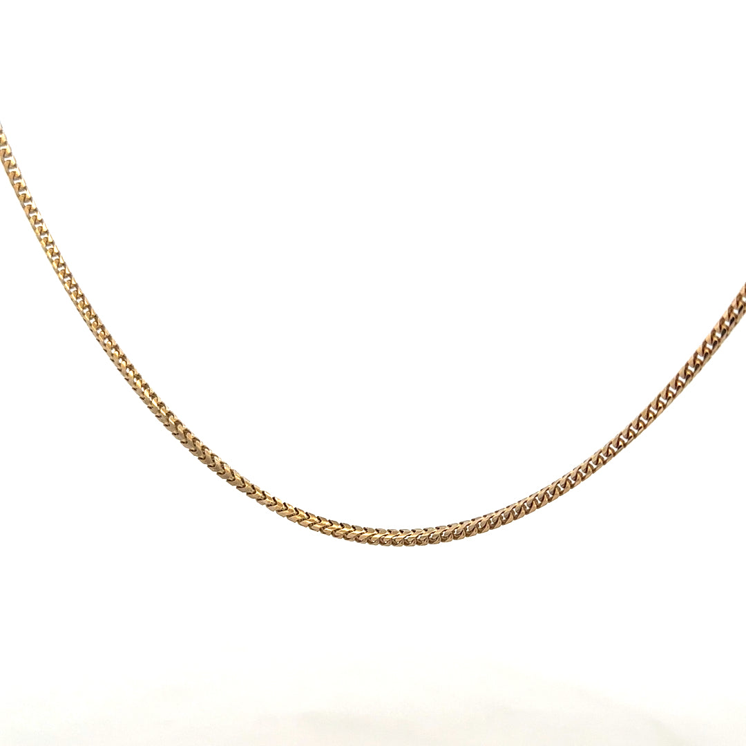 9ct yellow gold chain weighing 9.2g, featuring a classic linking design, unbranded jewelry for elegant wear.