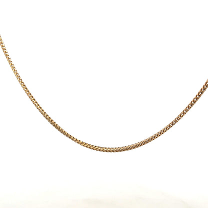 9ct yellow gold chain weighing 9.2g, featuring a classic linking design, unbranded jewelry for elegant wear.