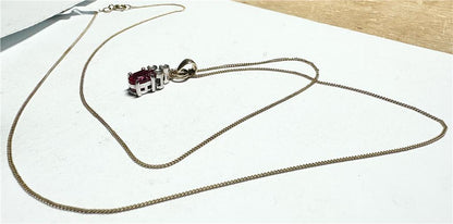 9ct yellow gold chain with diamond pendant, featuring a delicate design and sparkling diamonds, weighs 1.9 grams.