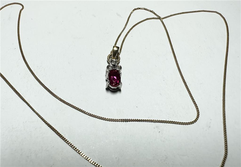 9ct yellow gold chain with a diamond pendant, weighing 1.9g, featuring a delicate design and sparkling gemstone.