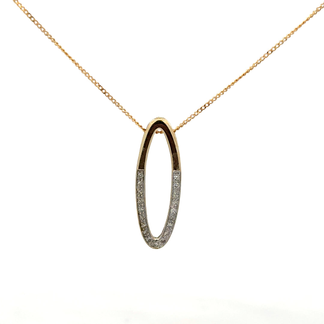 9ct yellow gold chain with diamond pendant, detailed close-up showing the elegant jewelry design and sparkling gemstone.