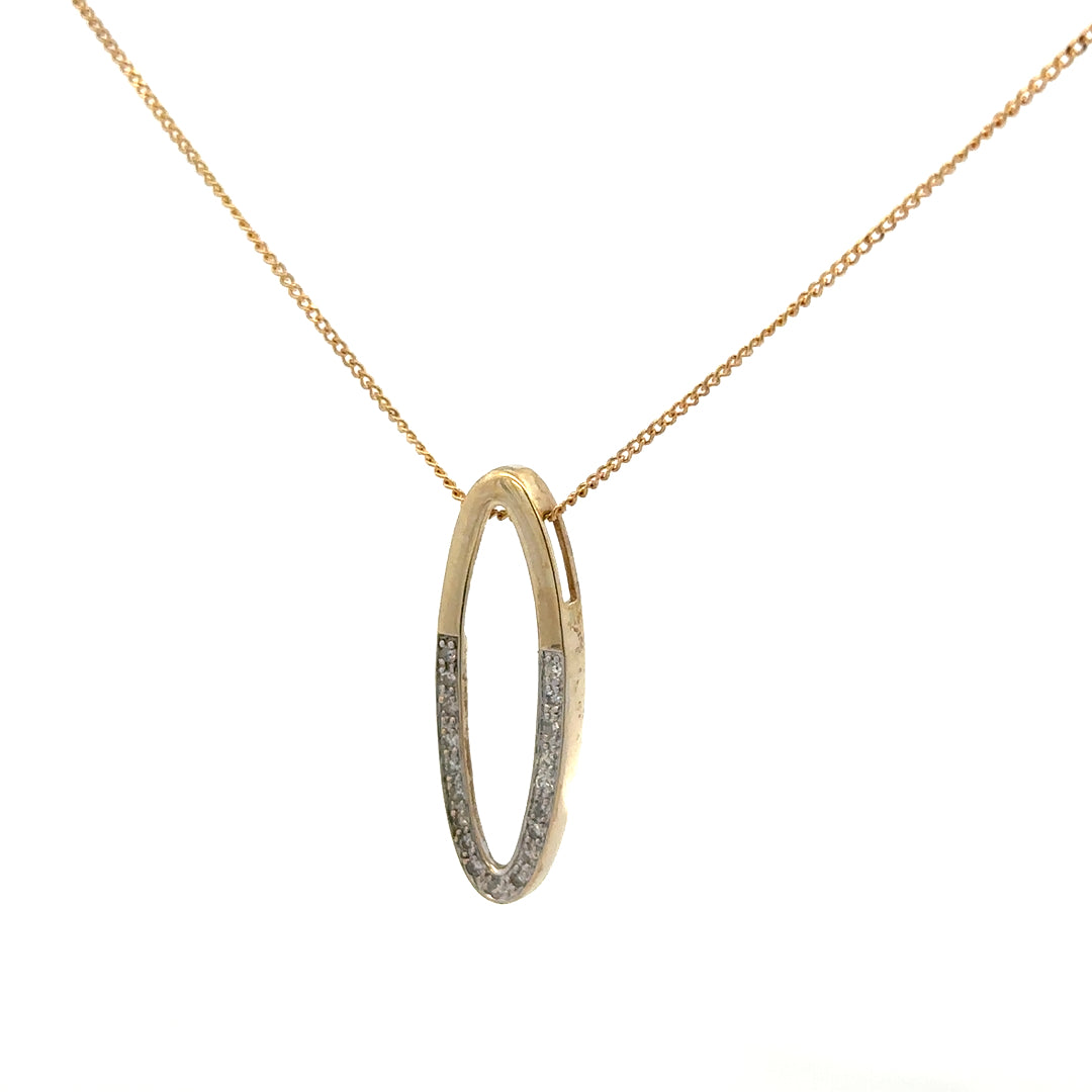 9ct yellow gold chain with diamond pendant, showcasing a delicate design and sparkling gemstone on a fine jewelry chain.