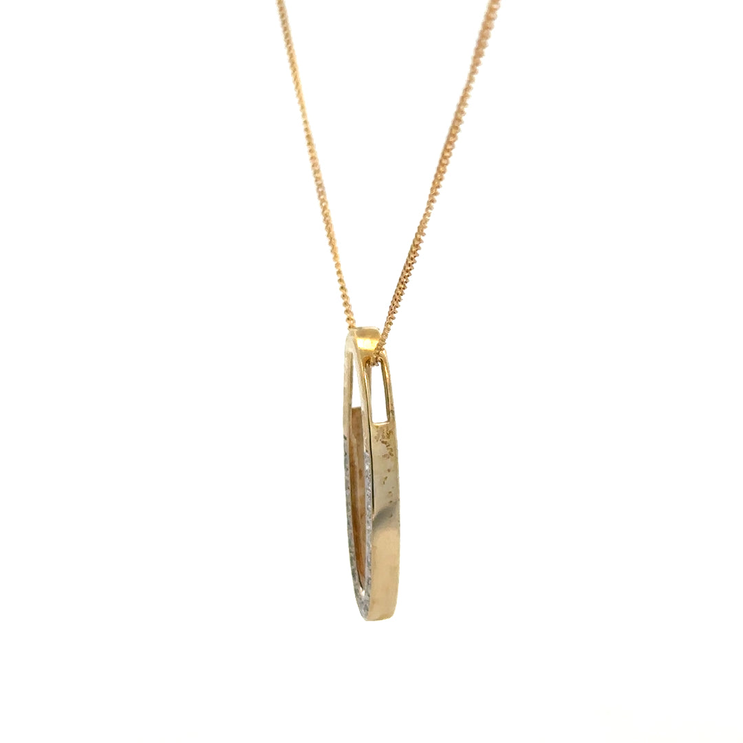 9ct yellow gold chain with diamond pendant, showcasing a delicate design and sparkling gemstones, weighing approximately 3 grams.