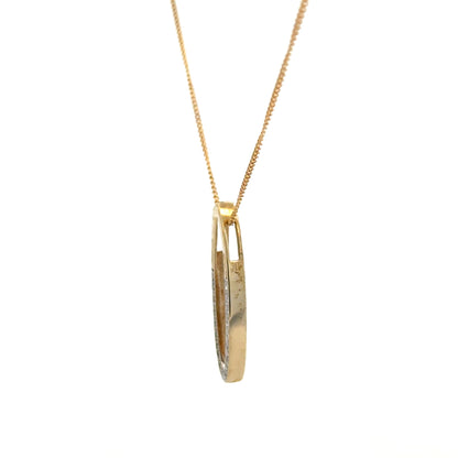 9ct yellow gold chain with diamond pendant, showcasing a delicate design and sparkling gemstones, weighing approximately 3 grams.