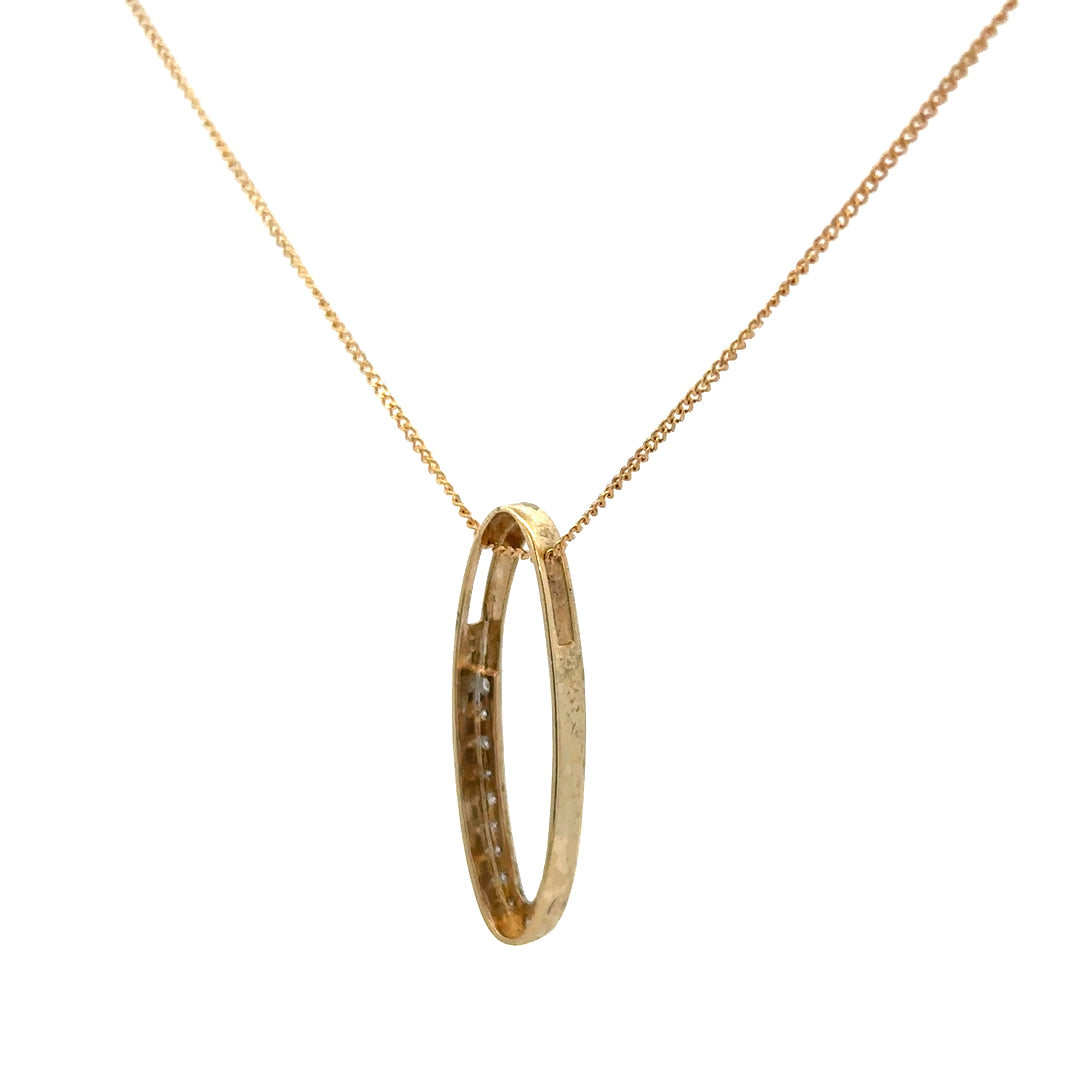 9ct yellow gold chain with diamond pendant, elegant jewelry piece, showcasing a delicate chain and sparkling diamond pendant.