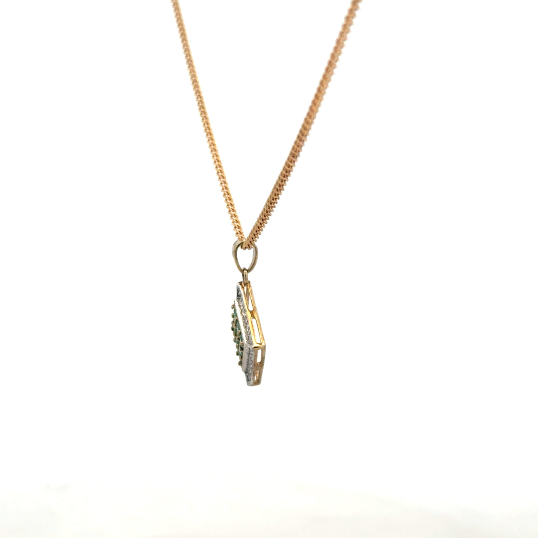 9ct yellow gold chain with emerald and diamond pendant, showcasing a detailed jewelry piece with vibrant gemstones and intricate design.