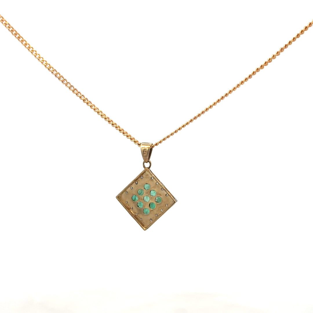 9ct yellow gold chain with a pendant featuring emeralds and diamonds, weighing 5.5g, unbranded jewelry.