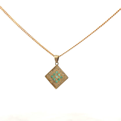 9ct yellow gold chain with a pendant featuring emeralds and diamonds, weighing 5.5g, unbranded jewelry.