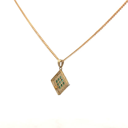 9ct yellow gold chain with emerald and diamond pendant, showcasing a delicate jewelry piece with vibrant gemstones and fine craftsmanship.