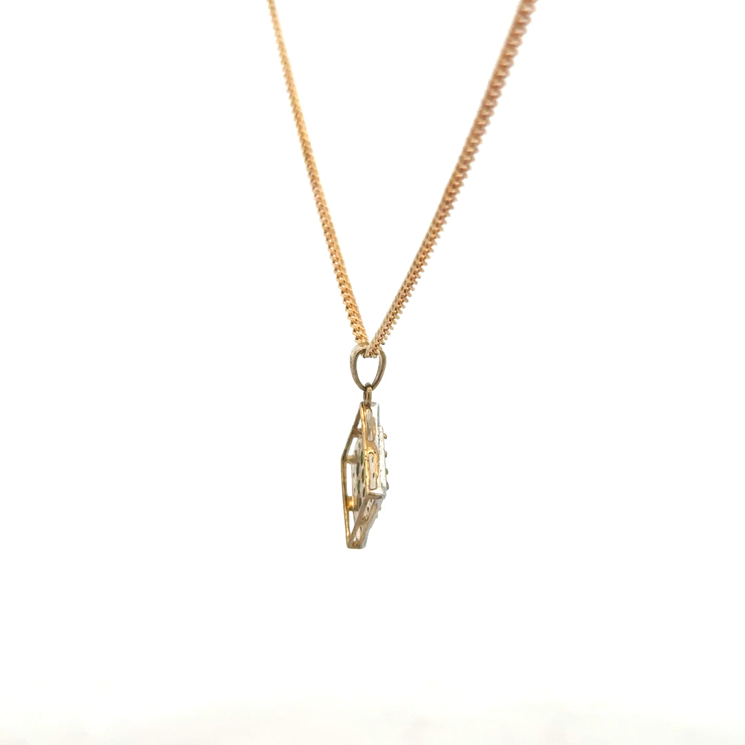 9ct yellow gold chain with emerald and diamond pendant, showcasing a elegant jewelry piece with vibrant gemstones and detailed craftsmanship.