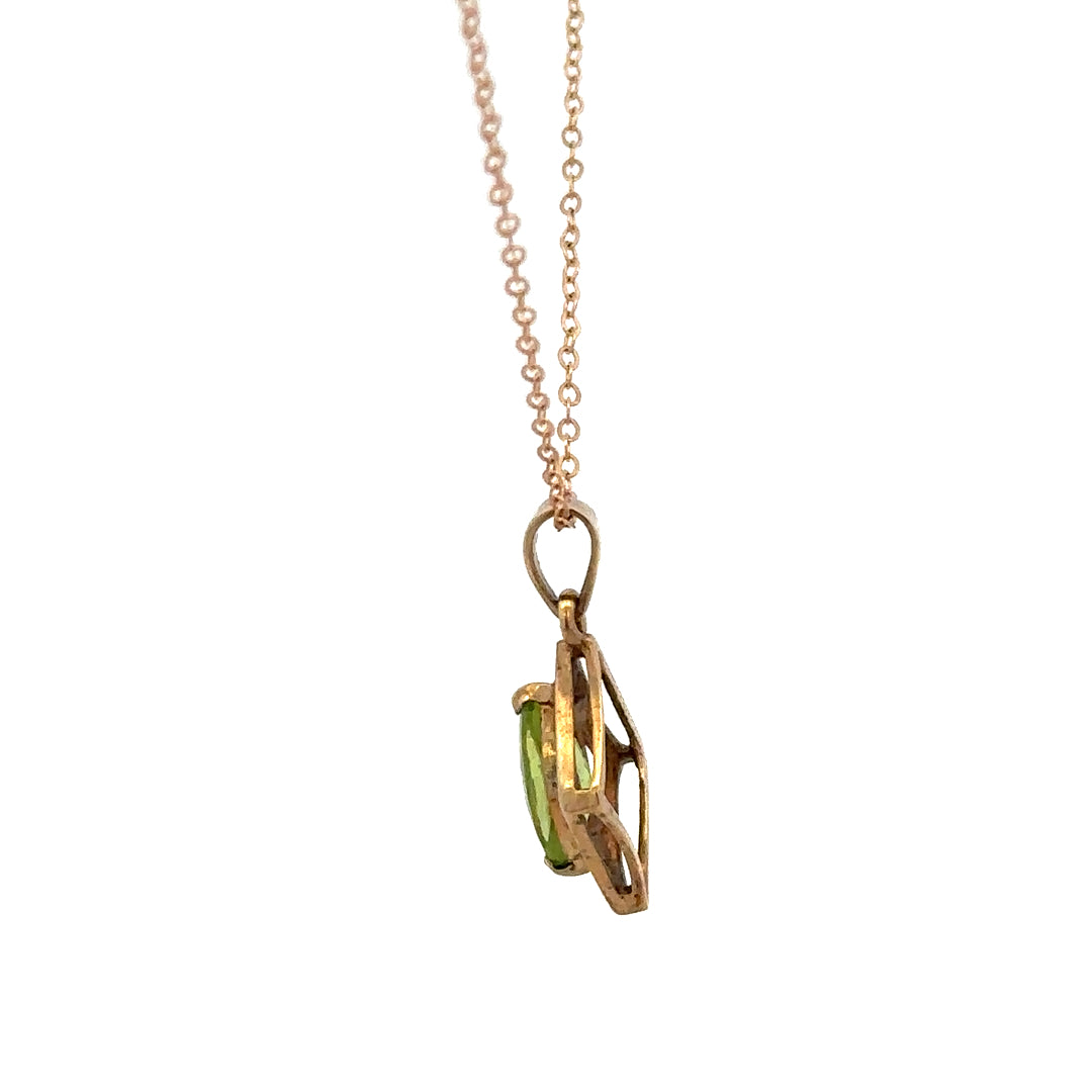 9ct yellow gold chain with pendant, unbranded jewelry, weight 2.2g, shown on a plain background with close-up detail.