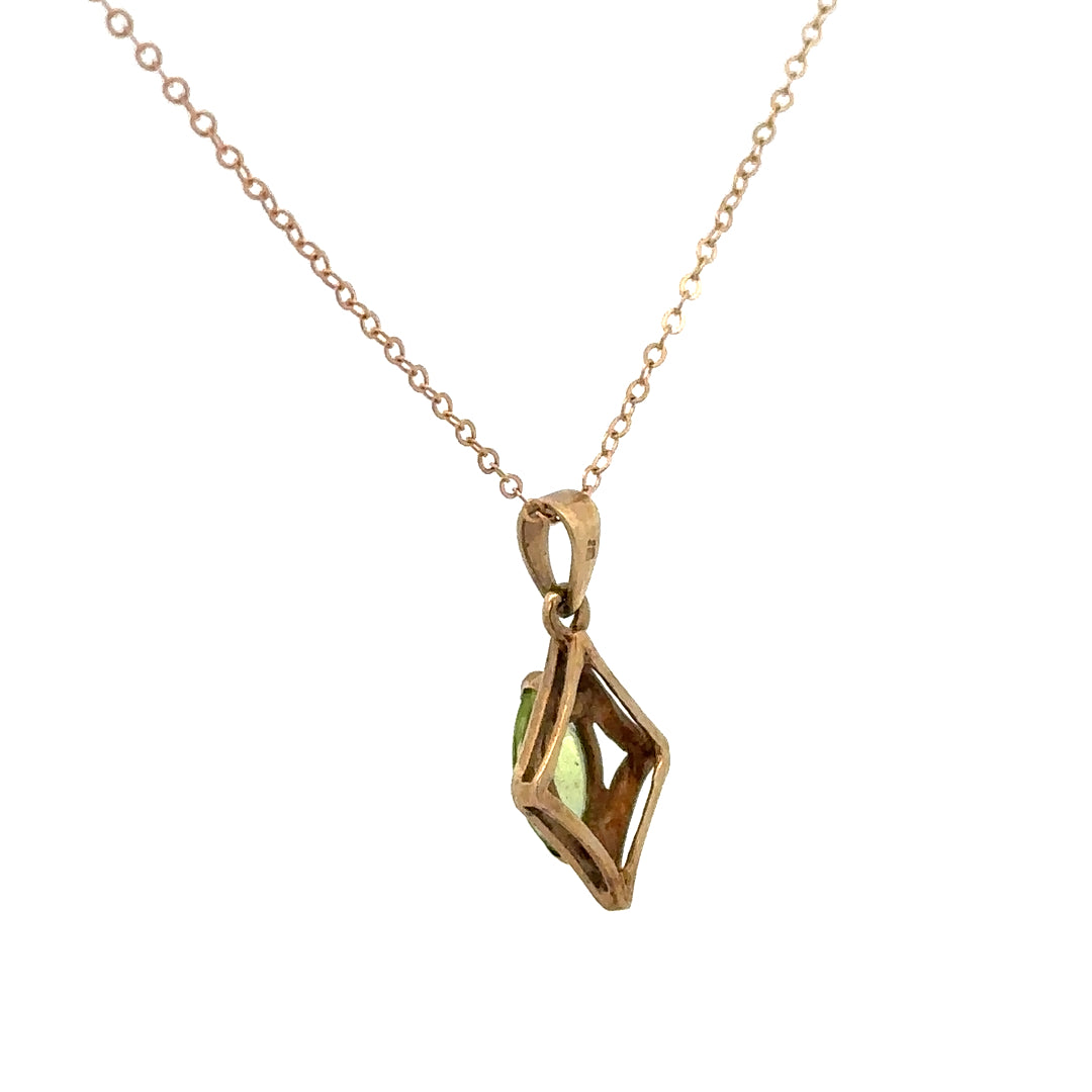 9ct yellow gold chain with pendant, weighing 2.2g, featuring a simple, elegant design in a close-up view.