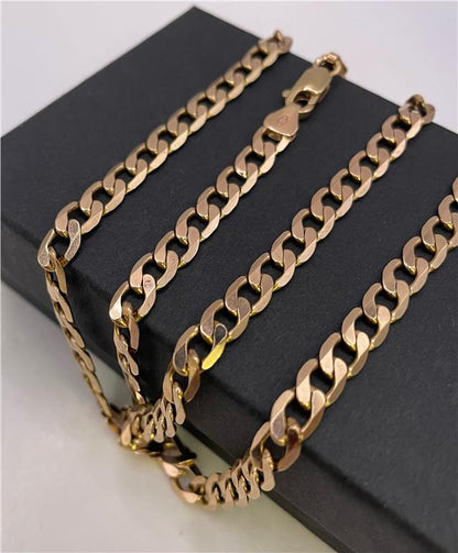 9ct yellow gold chain with a delicate link design, showcasing its polished finish and classic style.