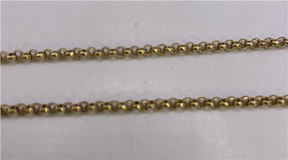 9ct yellow gold chain with a delicate link design, showcased in this image. Perfect for elegant jewelry styling.