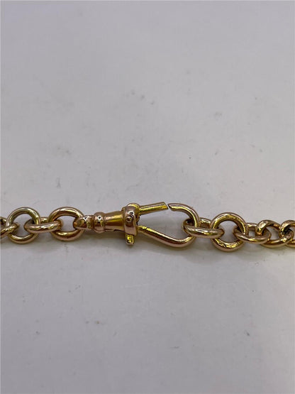 9ct yellow gold chain weighing 36.8g, unbranded, with a detailed close-up of the shiny, textured gold links.